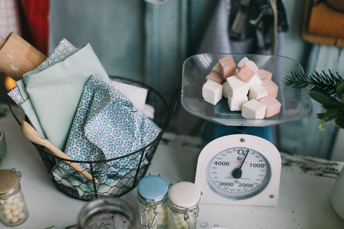 A kitchen scale among baking ingredients