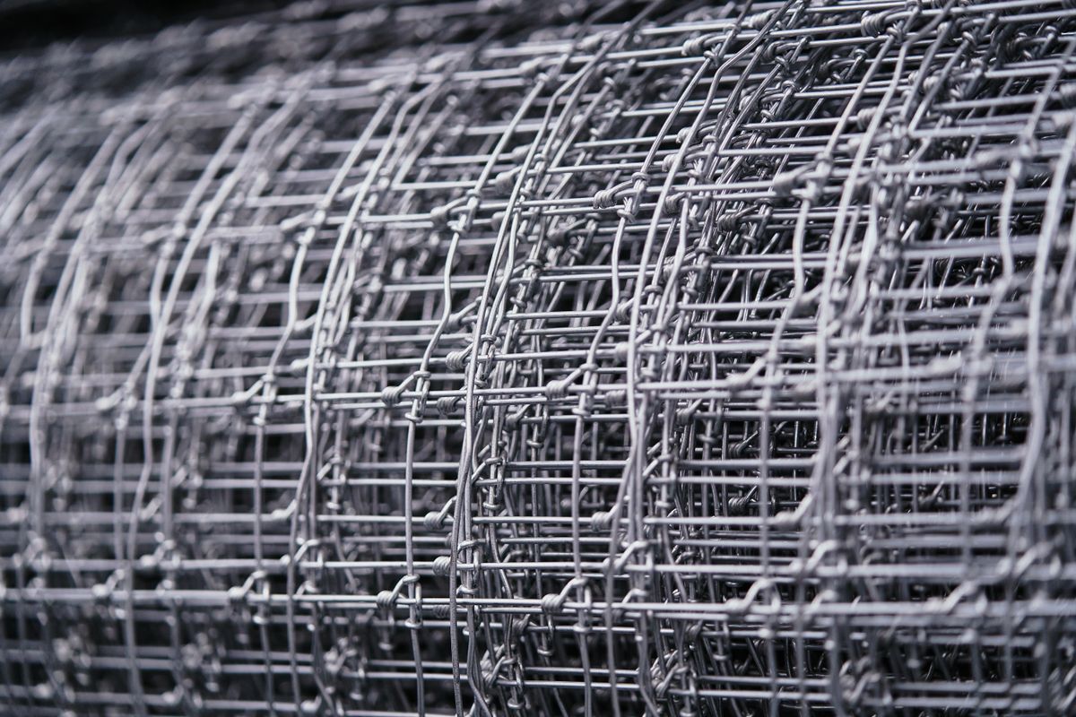 A roll of galvanised wire mesh fencing